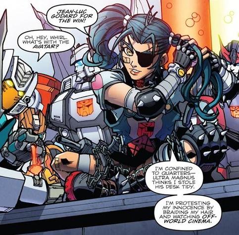 Screencap of Whirl's  projection, a teenage girl with blue hair and an eye patch over their right eye, decked out in post apocalyptic clothing, lots of pads with spikes on them, chain belt, that kind of thing.